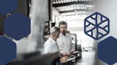 Photo of coworkers discussing in an office, with the threat actor icon for Typhoon actors superimposed