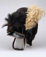 Helmet of the Buckingham Yeomanry Cavalry, inscribed ‘Buck’s Yeomanry strike home’, c1800. Soldiers from the yeomanry acted to deter grain rioters, suppress anti-militia disturbances and disperse mobs during industrial unrest.