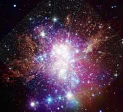 Scores of gleaming white orbs and tiny specks pack the blackness of space, surrounded by a purple haze, and mottled golden clouds.