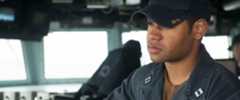 Navy Officer standing watch on the bridge of a DDG Destroyer