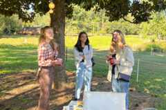 P Tomer, M Daniel, E McNell at the Pumpkin Patch Social