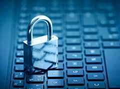 a pad lock on top of a computer keyboard