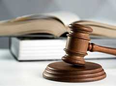 a gavel and two books