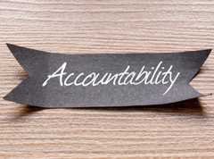 a black ribbon with the word accountability written on it