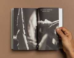 hand scrolling through a book