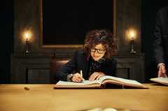 Emmanuelle Charpentier signs the Nobel Foundation's guest book
