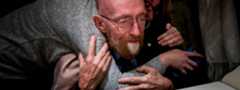 Kip Thorne at the Nobel Foundation reading the guestbook