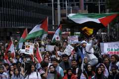 Pro-Palestinian protesters gather at a rally in front of Sydney's Town Hall last week. Photo: Getty