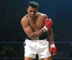 'Get up and fight, sucker!' a triumphant Muhammad Ali jeers at the felled Liston – Photo: Neil Leifer / Sports Illustrated
