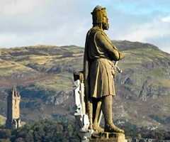 Robert the Bruce stands tall overlooking his beloved hills of Scotland