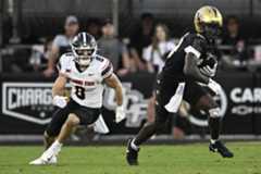 TOS-L-ucf-football-005.jpg UCF freshman receiver Waden Charles, right, has put together a big season for the Knights. (Phelan M. Ebenhack/Special to the Sentinel)
