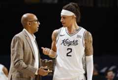 UCF Men’s Basketball UCF coach Johnny Dawkins talks with Riley Kugel (2) during game against the Oakland Golden Grizzlies in Addition Financial Arena at UCF, on Monday, Nov. 17, 2025. (Ricardo Ramirez Buxeda/Orlando Sentinel)