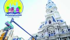 A view of City Hall from street level with the Philadelphia2050 logo superimposed on the image.