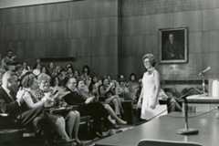 Loretta Ford stands confidently before a crowd, sharing her insights as a former dean of the School of Nursing.
