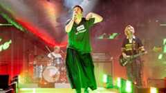 WYTHENSHAWE, ENGLAND - AUGUST 15:(EDITORIAL USE ONLY) Grian Chatten of Fontaines D.C. performs at Wythenshawe Park on August 15, 2025 in Wythenshawe, England. (Photo by Shirlaine Forrest/WireImage)