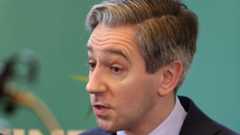 Tánaiste Simon Harris speaking to the media about nine-year-old Harvey Morrison