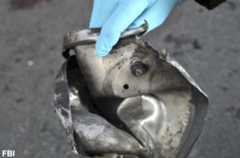 The remains of a pressure cooker that the FBI says was part of one of the bombs that exploded during the Boston Marathon. (Associated Press)