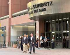 SUT-L-detention-congress-01 U.S. Reps. Sara Jacobs, Mike Levin, Juan Vargas and Scott Peters exit the Edward J. Schwartz Federal Building in downtown San Diego on Monday after visiting an immigration detention facility inside. (Alexandra Mendoza / The San Diego Union-Tribune)