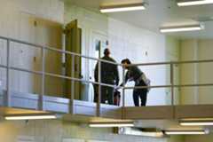 A deputy helps a medical staff member check on a woman incarcerated at the Las Colinas Detention and Reentry Facility on Jan. 28, 2026. (Nelvin C. Cepeda / The San Diego Union-Tribune)
