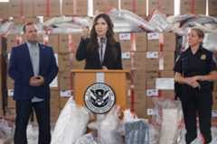 Homeland Security Secretary Kristi Noem, alongside Border Patrol Chief Michael Banks and Acting Executive Assistant Commissioner Diane Sabatino, speaks during a press conference on Thursday, Feb. 12, 2026 at the Otay Mesa border in San Diego. (Kristian Carreon / The San Diego Union-Tribune)