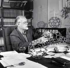 Richard Smalley with various buckyballs. 