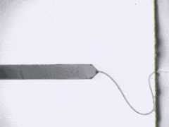 シリカ繊維のマイクロスケール引張試験