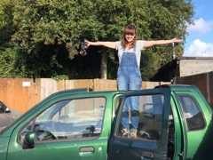 Ruth on her car/for Work from Home