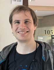 This picture shows Matthias Klumpp smiling into the camera