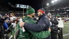 Saskatchewan Roughriders head coach Corey Mace and Montreal Alouettes head coach Jason Maas embrace following second half CFL football action at the 112th Grey Cup, in Winnipeg on Sunday, Nov. 16, 2025. (Fred Greenslade/CP)
