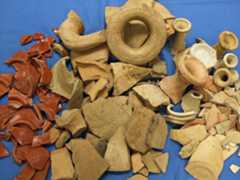 Broken pottery from a refuse pit behind a Roman shop near St Nicholas Circle. The assemblage included bowls, amphorae, jars and flagons suitable for storing and displaying food - University of Leicester Archaeological Services