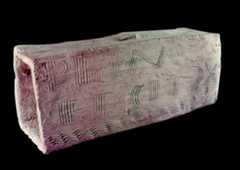 A Roman tile maker from Leicester has written the words PRIMUS FECIT X, meaning ‘Primus has made ten tiles’, on this box flue before it was fired - Leicester Arts & Museums Service