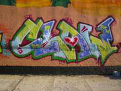 The word Claw tagged as graffiti on a wall