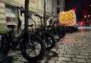 Bolton Police seized more than a dozen illegal e-bikes and scooters in the town centre.