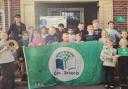Highfield Primary School Eco-Team with their new award The Green Flag Distinction plaque