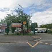 An agency staff member working at a school has been arrested