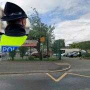 Woman arrested at school on suspicion of voyeurism after report of child being filmed