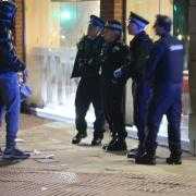 Police on the scene following reports of anti-social behaviour in Bolton town centre on Saturday,
