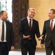From left: Scottish Labour MPs Ian Murray and Michael Shanks speak with UK Prime Minister Keir Starmer