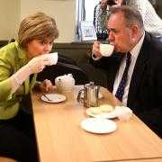 Nicola Sturgeon enjoys a cup of tea with Alex Salmond while on the General Election campaign trail in Inverurie in 2015