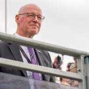 First Minister John Swinney pictured at the opening of Donald Trump's new golf course in Aberdeenshire