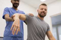 Doctor treating a patient 