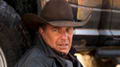 Kevin Costner as John Dutton leans against a car on Yellowstone