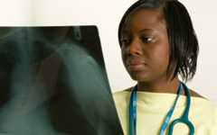Middlesex Hospital Medical colleague holding xray scan