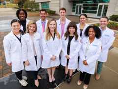 Members of the MD-PhD class are, front from left, Caroline Sit, Shelley Edwards, Madeline Griffin, Madison Hansen and Assata DeMyers;  and back from left, Hayley Murphy, Xavier Person, Jack Berman, Meredith Johnson and Garner Fincher.
