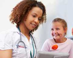 UMC quick care nurse with patient