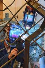 Two cadets review primary source materials in the VMI Archives