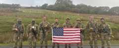 Members of the VMI Army ROTC Ranger Challenge team display their patriotism at Exercise Cambrian Patrol in the Brecon Beacons, a mountain range in Wales. --Photo courtesy of VMI Army ROTC.