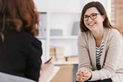 A patient's family member speaks with a Waypoint Centre team member.