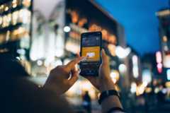 Person interacting with phone