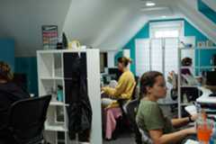 digital marketers working at computers in office